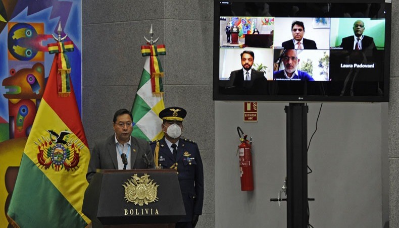 Bolivia's president Luis Arce speaks during the signing ceremony of the agreement with the Serum Institute of India for the purchase of 5 million of COVID-19 vaccines from the AstraZeneca laboratory at the Casa Grande del Pueblo government palace in La Paz, on 13 January 2021. -- AFP Photo