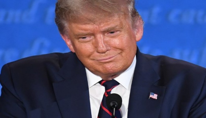In this file photo US President Donald Trump smiles during the first presidential debate at Case Western Reserve University and Cleveland Clinic in Cleveland, Ohio, on September 29, 2020.- AFP photo