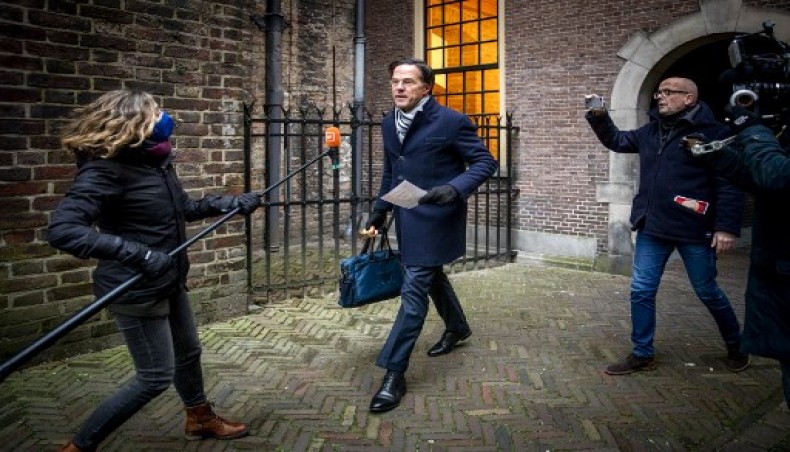 Dutch prime minister Mark Rutte is surrounded by the press as he arrives before the Council of Ministers at the Binnenhof in The Hague on January 15, 2021, where the ministers are meeting to discuss the political consequences of the benefits affair.- AFP photo