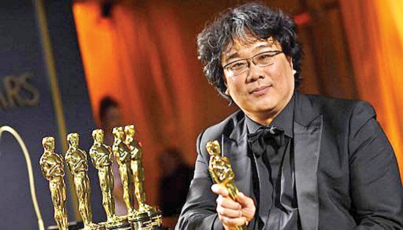 In this file photo taken on February 10, 2020 South Korean film director Bong Joon Ho poses with his engraved awards as he attends the 92nd Oscars Governors Ball at the Hollywood & Highland Center in Hollywood, California. — AFP photo