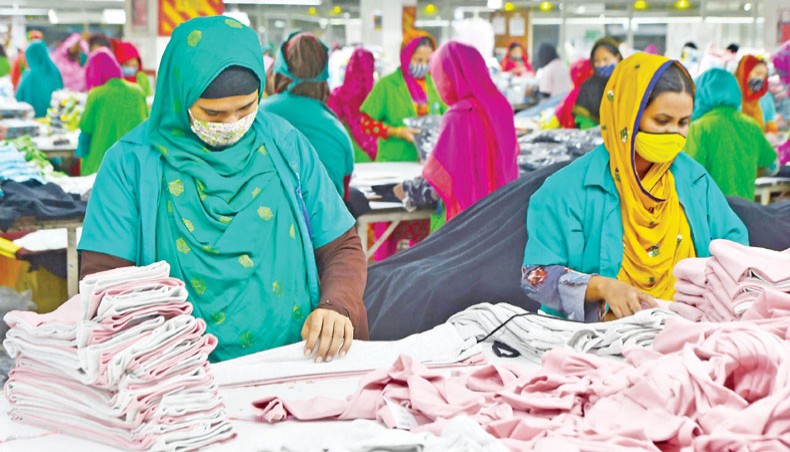 Private sector workers are excluded from the government’s COVID-19 vaccination programme though they continue to work braving risks of infection. This photo was taken at a garment factory at Mirpur in Dhaka on Friday. — Star Mail photo