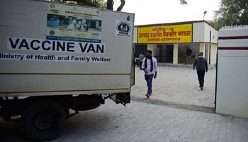 A van carries boxes of Covishield vaccine to different vaccination centres in Allahabad on January 15, 2021, a day before India starts the first phase of vaccination across the country. — AFP photo