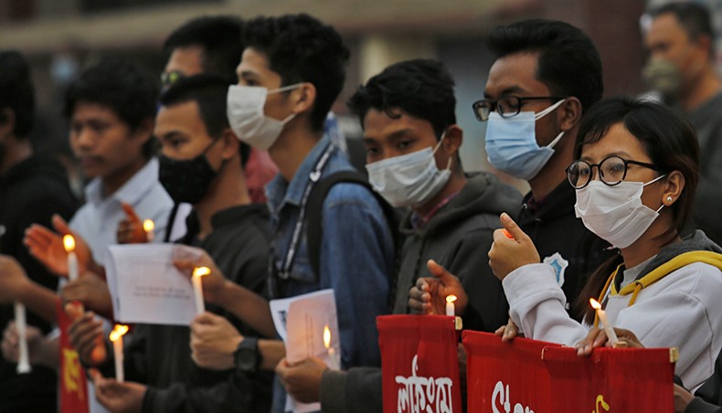 Rights activists hold a rally, demanding justice in the death of Lackimmey Chakma, in front of the parliament building in Dhaka on Saturday. — New Age photo