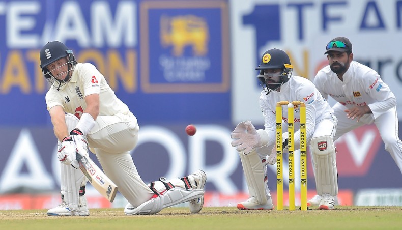 England captain Joe Root sweeps on the third day of their first Test against Sri Lanka at Galle on Saturday. — Sri Lanka Cricket photo