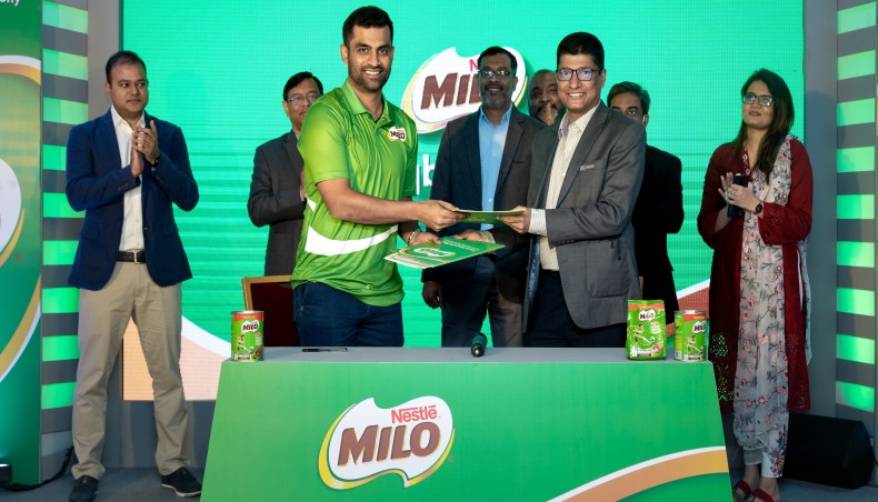 Bangladesh one-day international captain Tamim Iqbal (3rd-L) poses for a photograph after becoming the new brand ambassador of Milo, a cocoa malt beverage from Nestlé, on Monday. — Courtesy photo