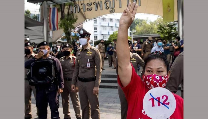 A woman protesting against section 112 of Thailand's penal code, which deals with lese majeste at Victory Monument in Bangkok on January 16. — AFP photo
