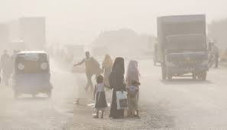 Dust engulfs the approach road to the Buriganga Bridge at Postogola in Dhaka as the years-long road construction work continues. The photo was taken on Monday, November 25, 2019. — Sony Ramany