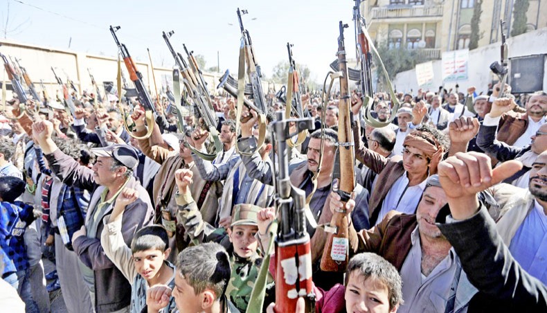 Supporters of Yemen's Huthi movement gesture as they chant slogans during a demonstration against the outgoing US administration's decision to designate the Iran-backed rebels as terrorists, in the capital Sanaa on Wednesday. — AFP photo