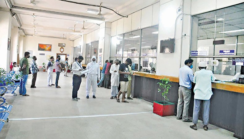 A file photo shows clients receiving services at a branch of a state-owned bank in the capital. Weighted average lending rate of 14 banks dropped below 7 per cent in December 2020 due mainly to the setting of lending rate ceiling at 9 per cent by the Bangladesh Bank to support the industrial expansion. — New Age photo