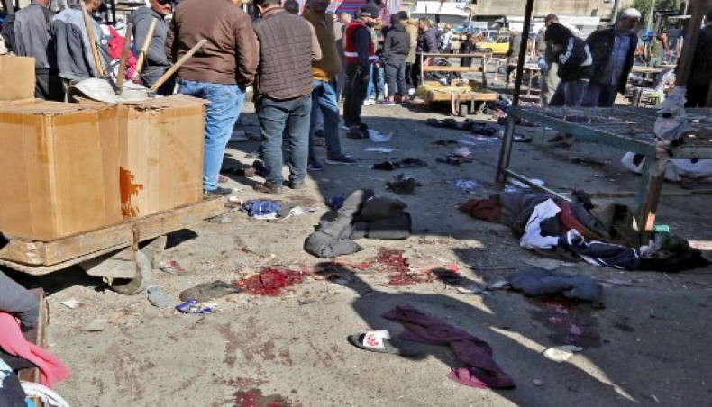 A picture shows the scene of a twin suicide bombing on a bustling commercial street in the heart of Baghdad on January 21, 2021.- AFP photo