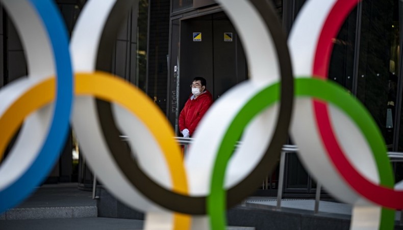 This picture taken on January 20, 2021 shows a staff member standing outside the Olympic Museum in Tokyo. — AFP photo