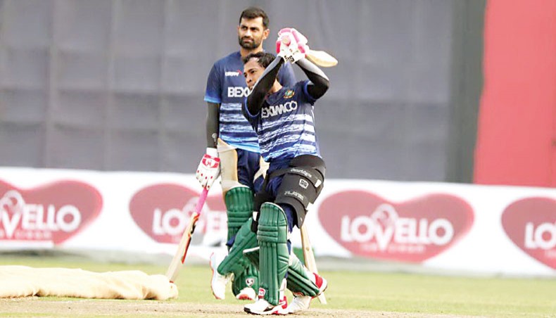Bangladesh batsman Mushfiqur Rahim plays a shot as captain Tamim Iqbal looks on during a training session at the National Cricket Academy Ground in Mirpur on Thursday. — BCB photo