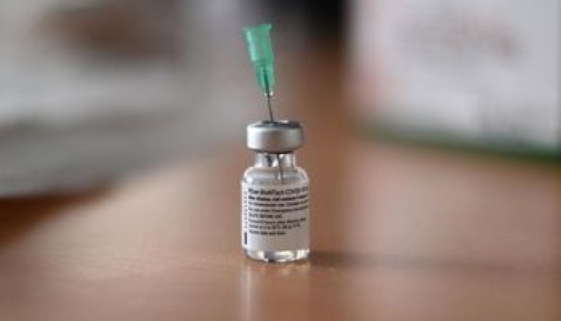 An injection needle sits in a vial with the Pfizer-BioNTech COVID-19 vaccine at the nursing home for seniors ‘Schmallenbach Haus’ in Froendenberg, western Germany, on January 22, 2021. — AFP photo