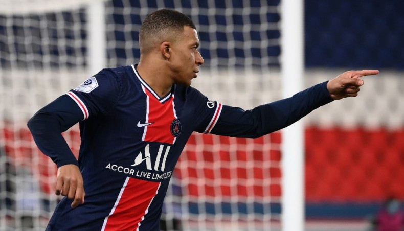 Paris Saint-Germain forward Kylian Mbappe celebrates after scoring a goal during their French L1 match against Montpellier at The Parc des Princes Stadium in Paris on Friday. — AFP photo