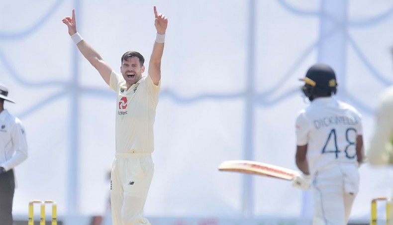 England paceman James Anderson (L) celebrates the wicket of Sri Lankan wicketkeeper-batsman Niroshan Dickwella on the second day of their second Test at Galle on Saturday. — SLC photo