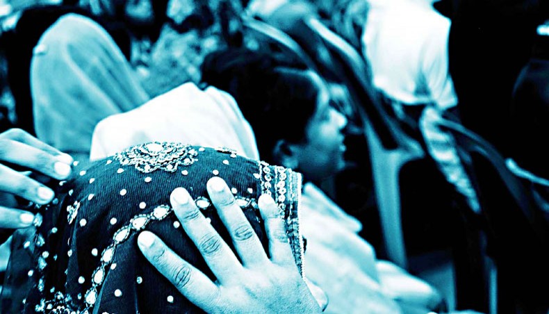 A garment worker is keeping up appearances. — Nazm-us Saadat
