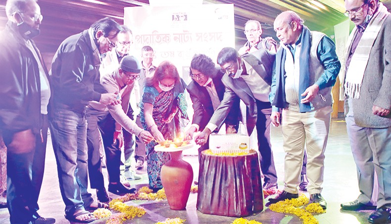 Guests and organisers light candles marking the 43rd founding anniversary of theatre troupe Padatik Natya Sangsad TSC at the National Theatre Hall of Bangladesh Shilpakala Academy on Saturday. — Sony Ramany