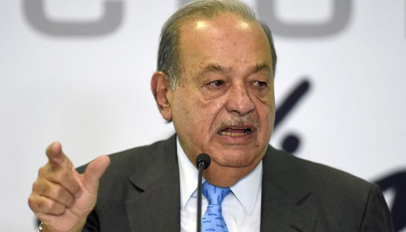 In this file photo taken on October 16, 2019, Mexican tycoon Carlos Slim gestures as he speaks during a press conference at the Inbursa office in Mexico City. -- AFP photo