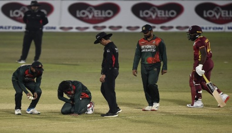 Bangladesh's Shakib Al Hasan (2L) reacts after being injured during their third and final one-day international against West Indies at the Zohur Ahmed Chowdhury Stadium in Chattogram on Monday. – AFP photo