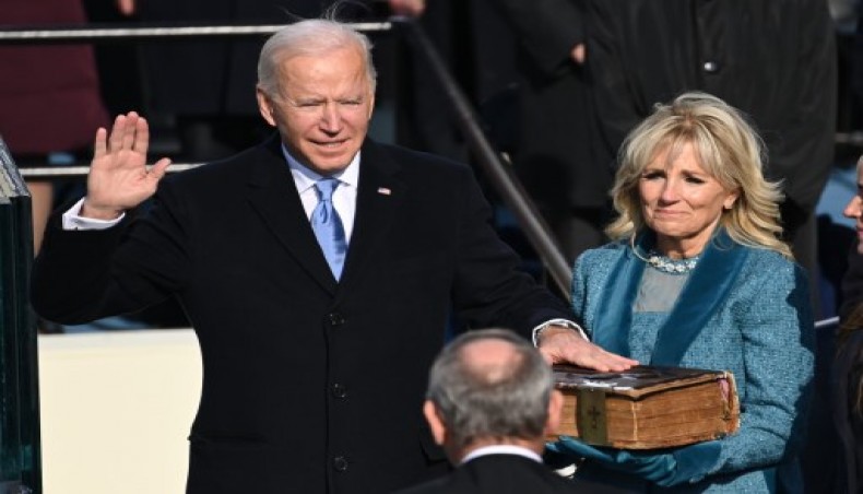 US president-elect Joe Biden is sworn in as his wife Jill Biden holds the Bible during the 59th Presidential Inauguration at the U.S. Capitol on January 20, 2021 in Washington, DC.- AFP photo