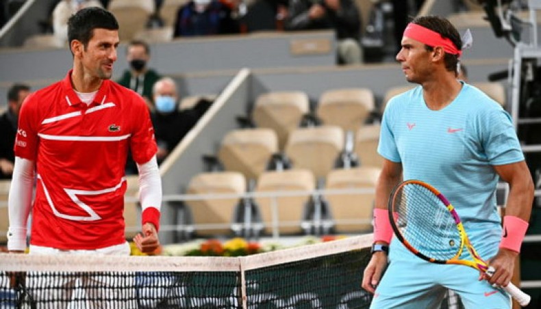 A file photo shows Rafael Nadal (R) with Novak Djokovic.-- Twitter photo