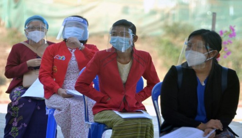 Myanmar health workers wait to receive a vaccine for the Covid-19 coronavirus at a hospital in Naypyidaw on January 27, 2021. -- AFP photo