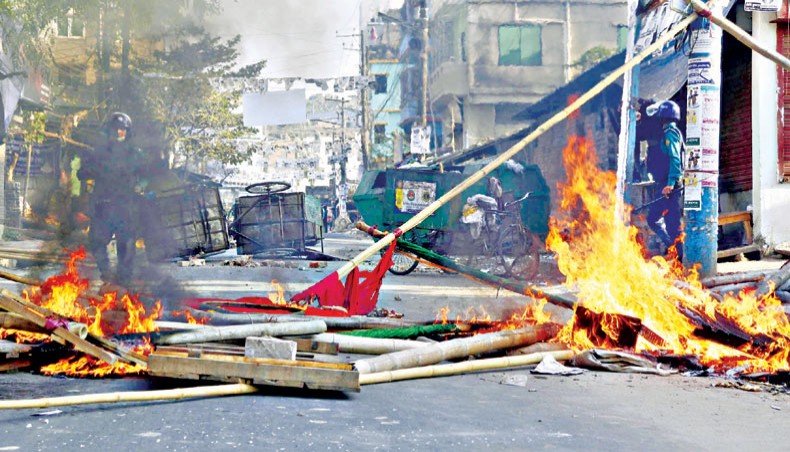 A fire burns election campaign booths in Chattogram during a clash between supporters of city corporation election candidates on Wednesday. — Focus Bangla photo