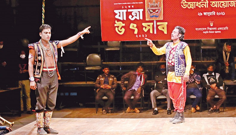 A jatra troupe performs at the 12th jatra festival at Experimental Theatre Hall of Bangladesh Shilpakala Academy on Friday. — Sourav Lasker