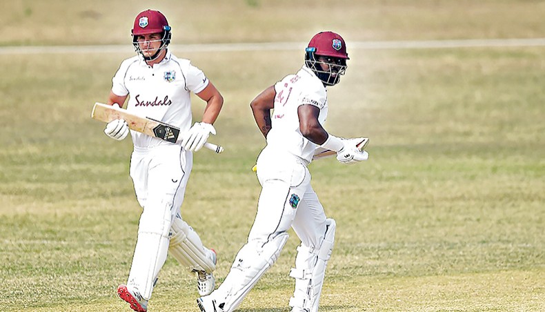 West Indies batsmen Raymon Reifer (R) and Joshua Da Silva run between the wickets on the third day of their three-day practice match against Bangladesh Cricket Board XI at the MA Aziz Stadium in Chattogram on Sunday. — AFP photo