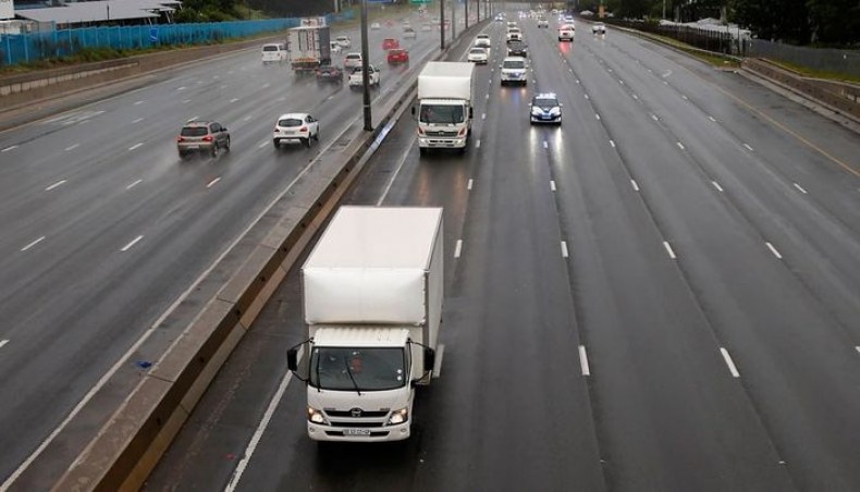 South African law enforcement agencies provide security in Johannesburg on February 1, 2021 for refrigerated trucks transporting AstraZeneca/Oxford vaccines for COVID-19 that arrived at OR Tambo International Airport toward where they will be stored. — AFP photo