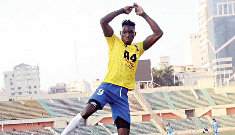 Sheikh Jamal Dhanmondi Club’s Gambian forward Pa Omar Jobe celebrates after scoring his team’s second goal against Abahani Limited during their Bangladesh Premier League at the BNS on Tuesday. — BFF photo