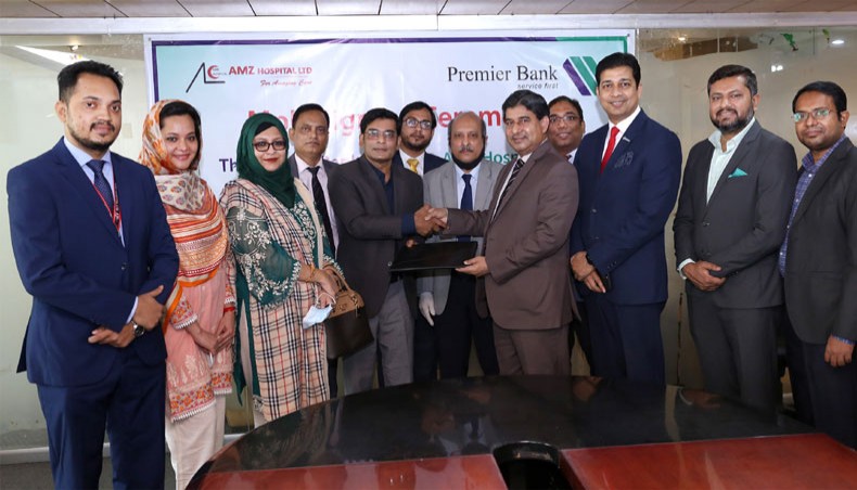 Attendants at a memorandum of understanding signing programme between Premier Bank and AMZ Hospital Limited recently. — Press Release Photo