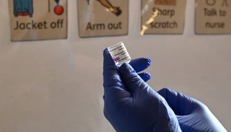 A health worker prepares a dose of the AstraZeneca/Oxford Covid-19 vaccine at a temporary vaccine centre set up at City Hall in Hull, northeast England on February 10, 2021.- AFP photo