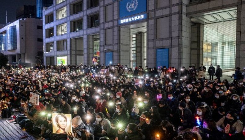 Activists take part in a protest outside United Nations University in Tokyo on February 11, 2021, against the February 1 coup by Myanmar's military.
