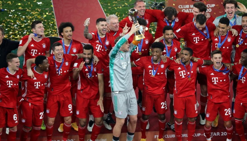 Bayern Munich captain goalkeeper Manuel Neuer (C) lifts the FIFA Club World Cup trophy after defeating Mexico's UANL Tigres in the final at the Education City Stadium in the Qatari city of Ar-Rayyan on Thursday. — AFP photo