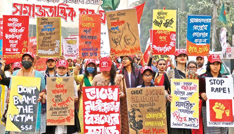 Nipiran o Bicharhinatar Biruddhe Bangladesh, a platform of various student organisations protesting against sexual harassment and impunity for offences, bring out a procession at Shahbagh in Dhaka on Friday. — New Age photo