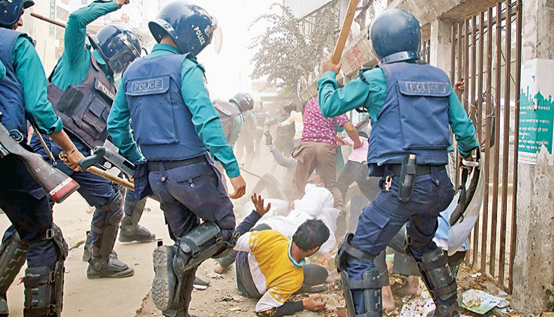 Police charge batons on BNP leaders and activists during a rally of the party in front of the National Press Club in Dhaka on Saturday. — Sony Ramany