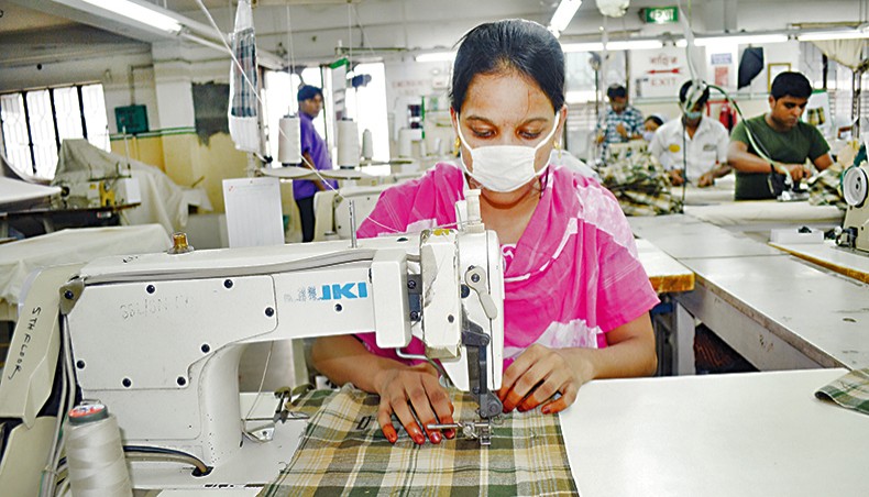 A file photo shows apparel workers sewing clothes at a factory on the outskirts of Dhaka. The country’s readymade garment exports to non-traditional markets in the July-January period of current financial year 2020-21 plunged by 9.44 per cent compared with that in the same period of the previous fiscal year due to an economic slowdown amid the COVID-19 pandemic. — New Age photo