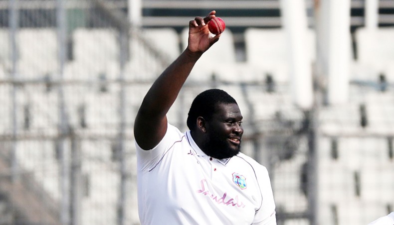 West Indies off-spinner Rahkeem Cornwall shows the ball after taking his fifth wicket on the third day of their second Test against Bangladesh at the Sher-e-Bangla National Stadium on Saturday. — BCB photo