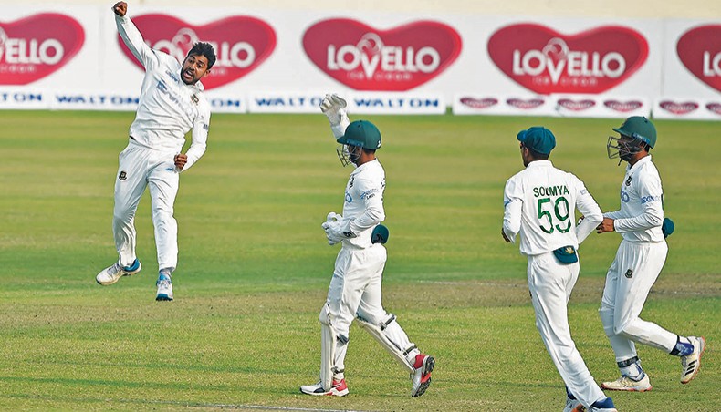 Bangladesh all-rounder Mehidy Hasan (L) celebrates the wicket of West Indies batsman Shayne Moseley on the third day of their second Test at the Sher-e-Bangla National Stadium on Saturday. — AFP photo
