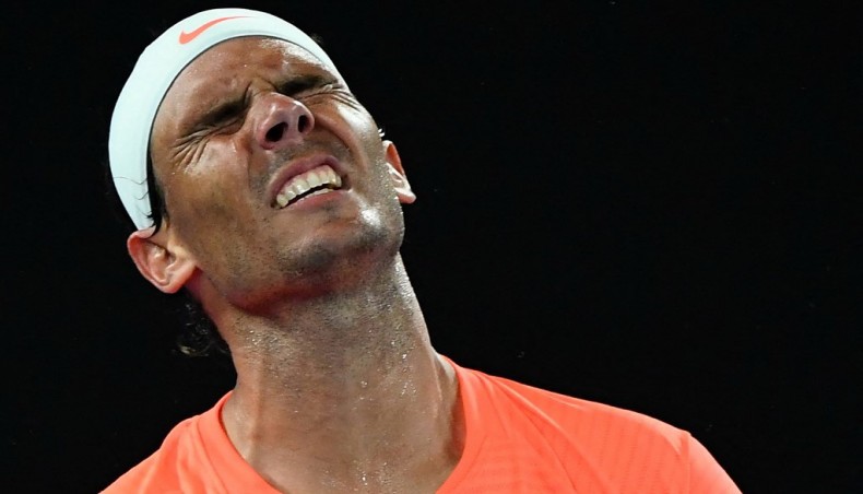 Spain's Rafael Nadal reacts after losing a point against Greece's Stefanos Tsitsipas during their men's singles quarter-final match of the Australian Open in Melbourne on Wednesday. — AFP photo