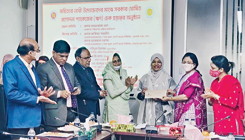Joyeeta Foundation managing director Afroza Khan distributes incentive package cheques among women entrepreneurs on Wednesday. — Press release