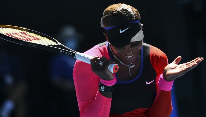 Serena Williams of the US reacts on a point against Japan's Naomi Osaka during their women's singles semi-final match of the Australian Open in Melbourne on Thursday. — AFP photo