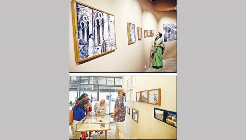 Visitors look at works by Sayeeda Khanam, above, and architect Bashirul Huq at the on-going Chobi Mela Shunya at DirkPath Bhaban in Dhanmondi. — Sony Ramany