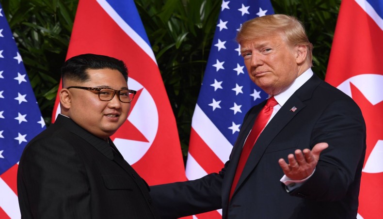 The then US president Donald Trump meets with North Korean leader Kim Jong Un in Singapore in June 2018.- AFP file photo
