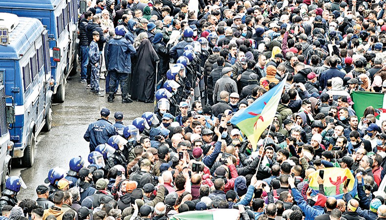 Algerians rally in the capital Algiers on Sunday, marking the second anniversary of the country’s anti-government ‘Hirak’ protest movement. — AFP photo
