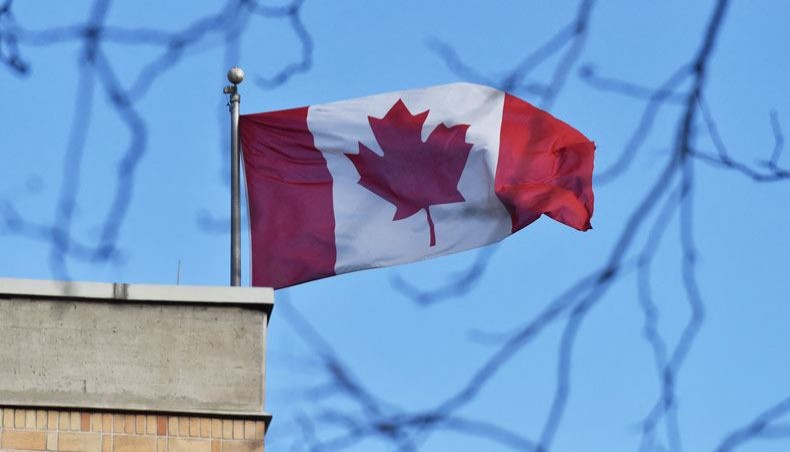 In this file photo the Canadian flag flies above the Canadian embassy in Beijing on January 15, 2019. -- AFP photo