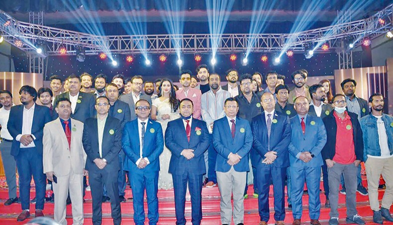 Guests along with cast and crew members of the upcoming film Operation Sunderban pose for a photo at the launching ceremony of teaser of the film at Army Golf Club in Dhaka on Tuesday. — Press release