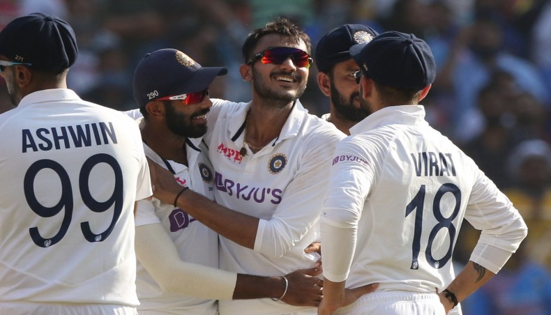 Indian spinner Axar Patel (C) celebrates one of his six wickets against England on the opening day of their day-night Test in Ahmedabad on Wednesday. — BCCI photo