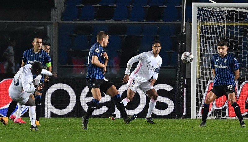 Real Madrid defender Ferland Mendy (L) shoots to score against Atalanta during their UEFA Champions League round of 16 first leg match at the Atleti Azzurri d'Italia stadium in Bergamo on Wednesday. — AFP photo